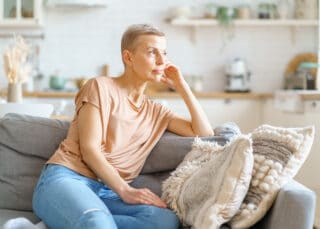 Thoughtful Beautiful Middle Aged Woman In Casual Clothes Dreamin
